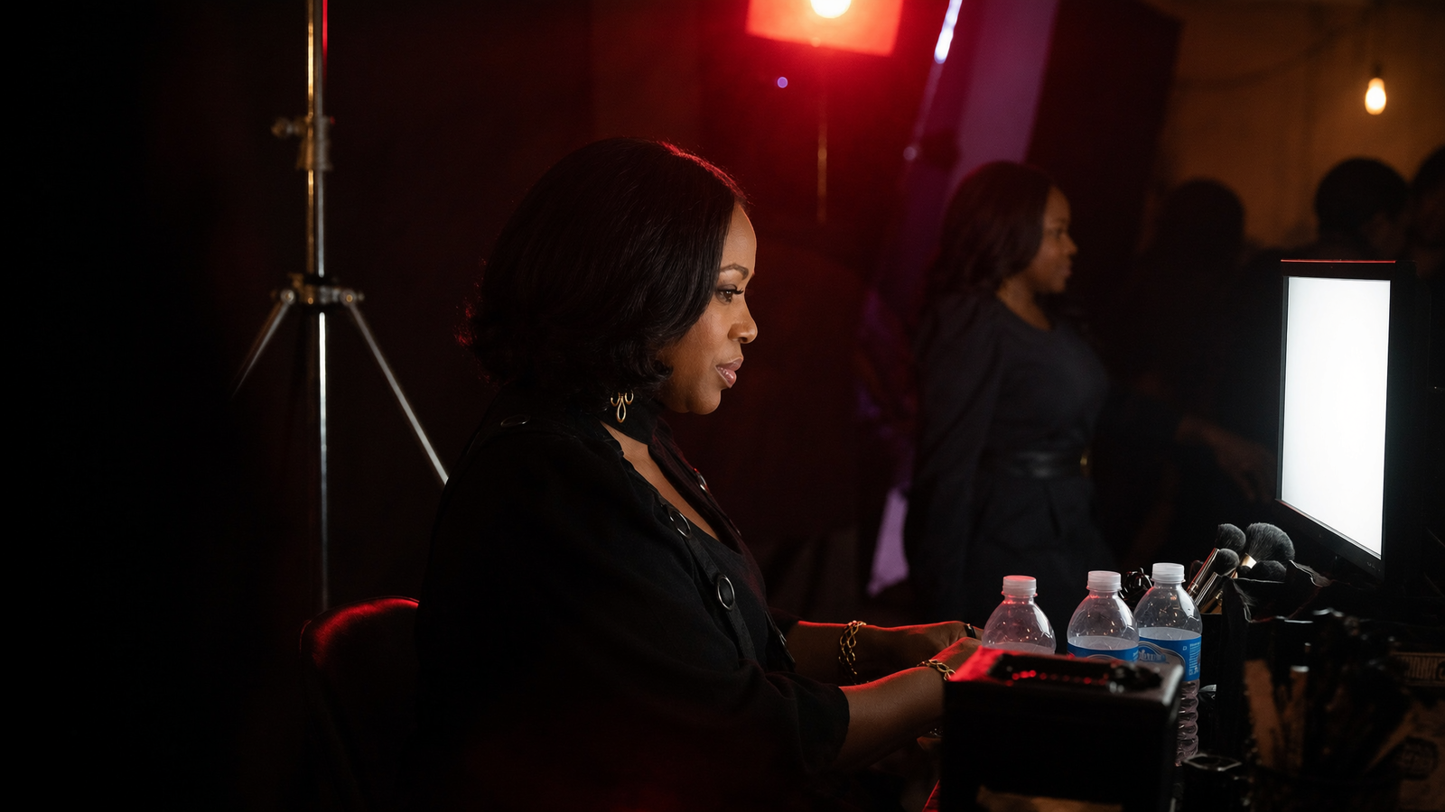 Cinematic LMB Film Set stage direction with chair, monitor, vanity, and production lighting.