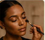 Makeup brush applying a camera-ready look